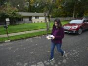 Candidate Monica Stonier walks a Vancouver neighborhood in October 2016, talking to residents about the upcoming election.