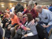 Linda Garcia, front and center, celebrates after Washington’s Energy Facility Site Evaluation Council rejected the Port of Vancouver oil terminal at the John A. Cherberg Building in Olympia on Nov. 28, 2017. Garcia was one of six people worldwide to receive the Goldman Environmental Prize for her work blocking the terminal.