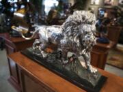 A pure silver lion sculpture, called "Sovereign Reign," at Foundry Michelangelo in Battle Ground.