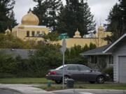 The Guru Ramdass Gurdwara Sahib, which is nearing completion on Northeast 20th Street, looms over homes in Vancouver’s Landover-Sharmel neighborhood.