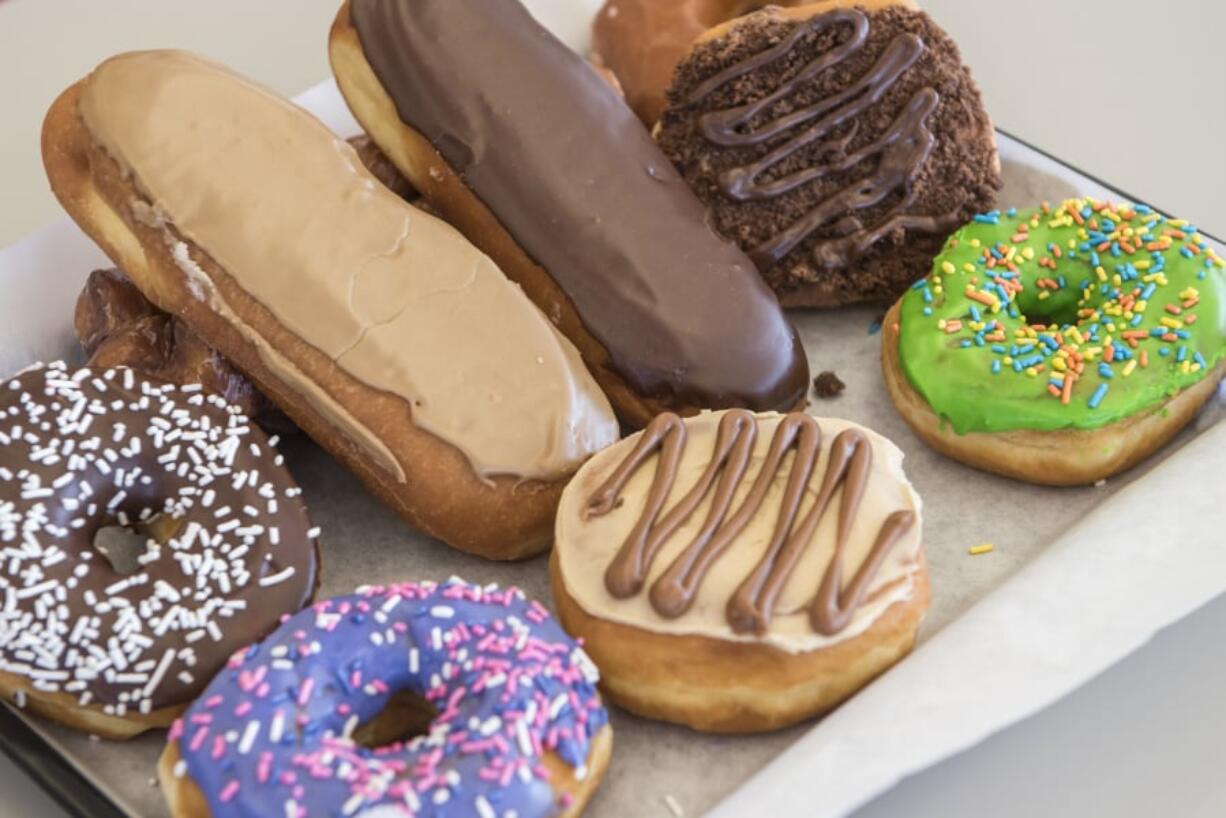 A tray of treats tempts customers at the new Mr. Maple Donuts shop in Hazel Dell. Coffee drinks and bagel breakfast sandwiches are also on the menu.