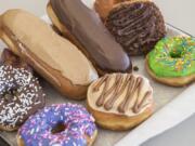 A tray of treats tempts customers at the new Mr. Maple Donuts shop in Hazel Dell. Coffee drinks and bagel breakfast sandwiches are also on the menu.