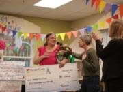 Orchards: Orchards KinderCare Learning Center prekindergarten teacher Kimberly Green was surprised with KinderCare Education’s Legacy Award and a $5,000 check during a Dr. Seuss party in her class.