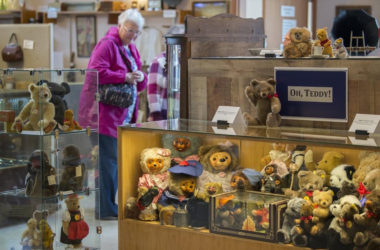 A collection of teddy bears greets visitors like Jan Kerr of Portland at Two Rivers Heritage Museum in Washougal, which opened up for the season in March. The new main exhibit this year is all about teddy bears.