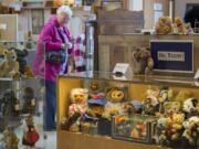 A collection of teddy bears greets visitors like Jan Kerr of Portland at Two Rivers Heritage Museum in Washougal, which opened up for the season in March. The new main exhibit this year is all about teddy bears.