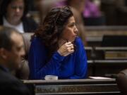 Rep. Monica Stonier listens to her fellow representatives during session April 9 in Olympia.