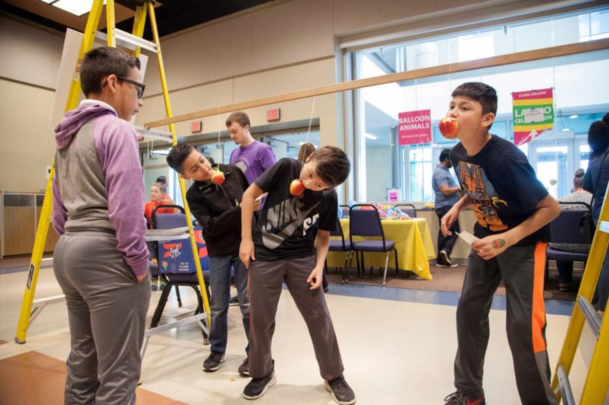 Local families enjoy bilingual fun and games at Clark College during 2018’s combined celebration of children, diversity and literacy — the annual “Celebracion de Mi Gente: El Dia del Nino/El Dia del Libro,” or “Celebration of My People/Day of the Child/Day of the Book.” This year’s free event is set for the evening of April 26.