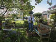 Spring is in full bloom in the garden of longtime northwest Vancouver resident Kay Viviani as she keeps the area in top shape Thursday morning, April 25, 2019. Viviani said she has been gardening since she was a child and learned to love the activity from her grandfather. She helps bring about 200 plants to life each year and she keeps up the garden in tribute to her late husband, Nick Viviani, who passed away in 2016. Gardening was a past time they enjoyed together and she hopes to share it with those passing by. "It's not put in just for me or my husband, it's for everybody," she said.