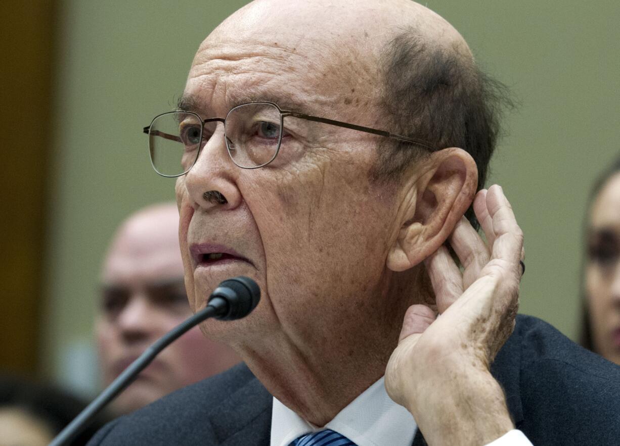 In this Thursday, March 14, 2019, file photo Commerce Secretary Wilbur Ross testifies during the House Oversight Committee hearing on Capitol Hill in Washington. A third federal judge has blocked the Trump administration from adding a citizenship question to the 2020 census.  U.S. District Judge George Hazel in Maryland ruled Friday, April 5, 2019, that  the addition of a citizenship question is “arbitrary and capricious.” Ross added a citizenship question to the 2020 census.