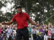 Tiger Woods reacts as he wins the Masters golf tournament Sunday, April 14, 2019, in Augusta, Ga. (AP Photo/David J.