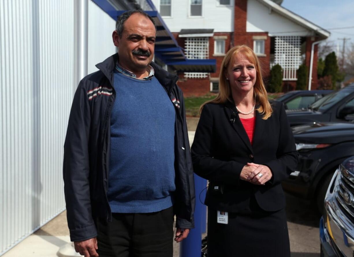 Mohamed Fathy Hussein Zayan and attorney Michelle Protzman speak during a news conference Thursday, April 4, 2019, at the Barboursville Police Department in Barboursville, W.Va. A charge is being dismissed against Mohamed Fathy Hussein Zayan, who was arrested after a woman told police that he tried to abduct her young daughter but later said she might have been overreacting, a prosecutor said Thursday. Cabell County Prosecutor Corky Hammers said an attempted abduction charge will be dropped against Mohamed Fathy Hussein Zayan, who was arrested Monday at the Huntington Mall food court in Barboursville.