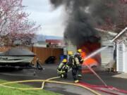 The Camas-Washougal Fire Department was dispatched Tuesday to a garage on fire in the 2200 block of Northwest 23rd Avenue in Camas. Firefighters were able to protect a nearby home, but the garage and its contents are considered a total loss.