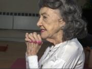 In this April 5, 2019, image made from a video, 100-year-old Tao Porchon-Lynch teaches a yoga class in Hartsdale, N.Y.