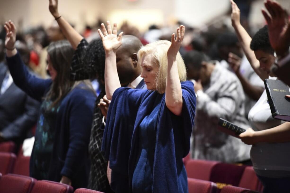 Sen. Kirsten Gillibrand, D-N.Y., worships at Mount Moriah Missionary Baptist Church on Feb. 10 in North Charleston, S.C.