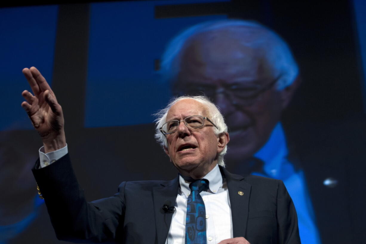 In this April 1, 2019, file photo, Democratic presidential candidate Sen. Bernie Sanders, I-Vt., speaks during the We the People Membership Summit in Washington. Sanders is leading Democratic presidential candidates in the early money chase with more than $18 million in contributions during the first seven weeks of his candidacy.