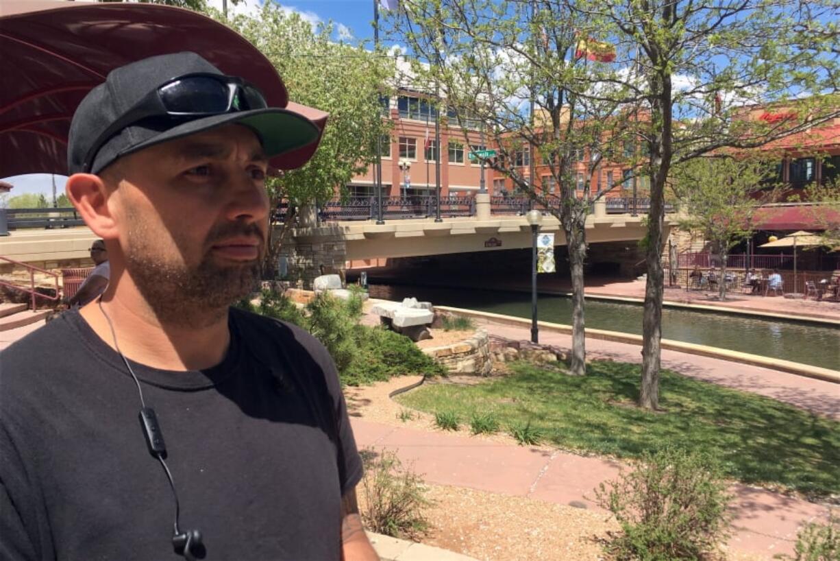 Rhett Lucero, 40, an auto body shop mechanic poses for a photo on April 24, 2019, in Pueblo, Colo. Republicans are warning that Democratic proposals aimed at providing universal health care and curbing greenhouse gas emissions show that Democrats want to turn the U.S. toward socialism. Lucero, says Democrats’ efforts to expand health coverage and curb global warming make sense.