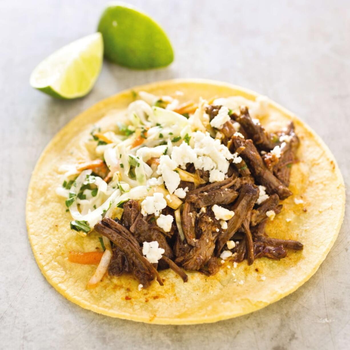 This undated photo provided by America’s Test Kitchen in March 2019 shows Shredded Beef Tacos in Brookline, Mass.