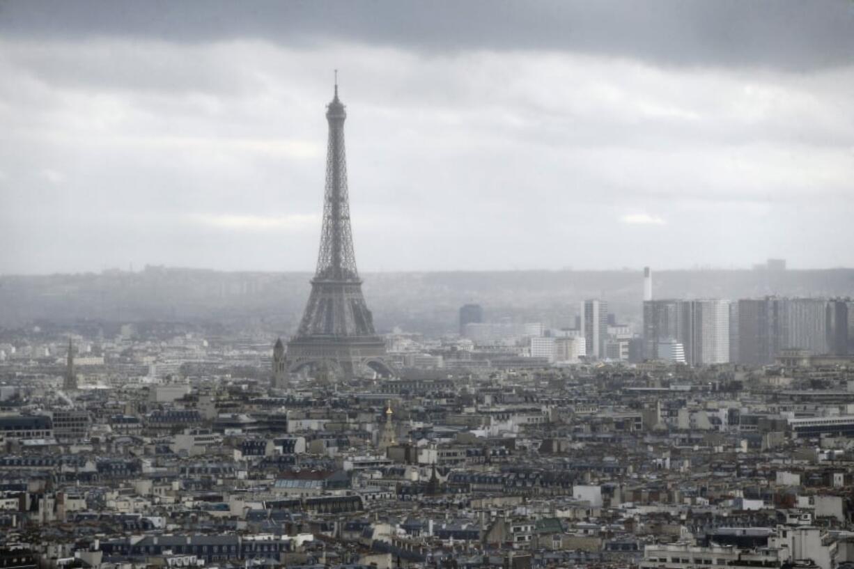 The Eiffel Tower from the Paris new courthouse, in Paris. Monuments are the emotional backbone of France. That accounts for the despair over a blaze that killed no one, yet seared the collective soul. It is the power Notre Dame had _ still has, despite the charred scars on its Gothic walls.