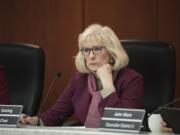 County Council Chair Eileen Quiring listens during a County Council meeting in April 2019.