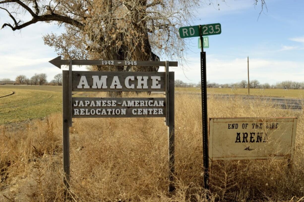 FILE - This Jan. 18, 2015, file photo shows a sign at the entrance to Camp Amache, the site of a former World War II-era Japanese-American internment camp in Granada, Colo. A University of Denver team is using a drone to create a 3D reconstruction of the camp in southern Colorado. The Amache effort is part of a growing movement to identify and preserve historical sites connected to people of color in the U.S.