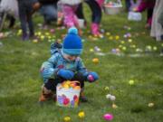 Jasper Poulton collects Easter eggs in Ridgefield during a 2018 egg hunt.