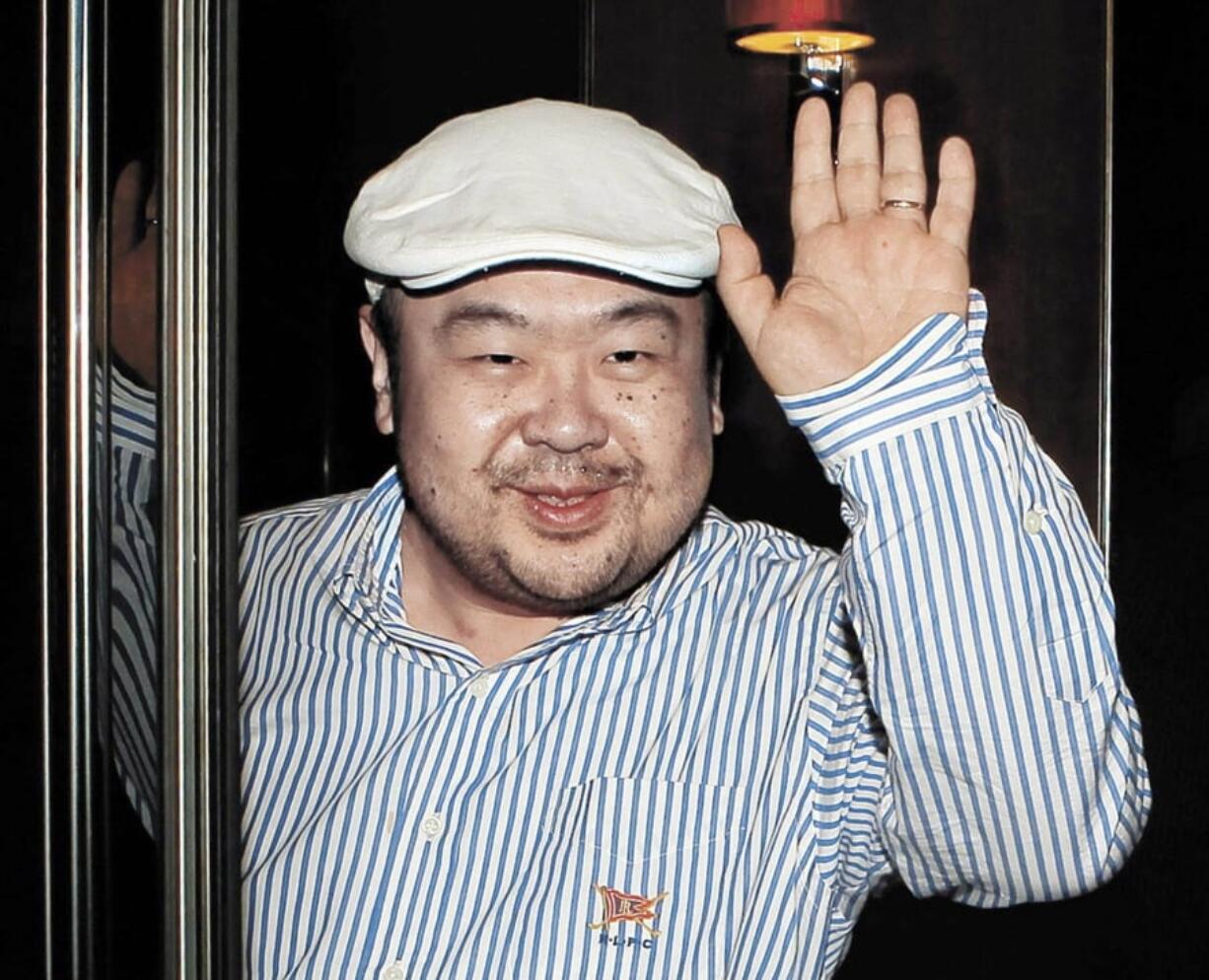 FILE - In this June 4, 2010, file photo, Kim Jong Nam, the eldest son of then North Korean leader Kim Jong Il, waves after his first-ever interview with South Korean media in Macau. The murder of North Korean leader Kim Jong Un’s estranged half-brother at an airport in Malaysia was brazen, intricately orchestrated and, thanks to scores of security cameras, witnessed by millions around the world. The real masterminds behind the killing, however, may never be brought to justice.