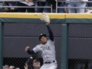 Seattle Mariners center fielder Mallex Smith can’t make the play on a two-run double by Chicago White Sox’s Yoan Moncada during the first inning of a baseball game Friday, April 5, 2019, in Chicago. (AP Photo/Nam Y.