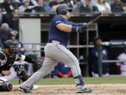 Seattle Mariners’ Daniel Vogelbach hits a three-run double against the Chicago White Sox during the third inning of a baseball game in Chicago, Sunday, April 7, 2019. (AP Photo/Nam Y.