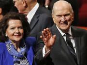 FILE - In this Oct. 6, 2018, file photo, President Russell M. Nelson and his wife, Wendy, wave as they leave the morning session of a twice-annual conference of The Church of Jesus Christ of Latter-day Saints in Salt Lake City. Nelson has generated buzz in his first year by becoming one of the most visible presidents in modern church history and implementing a number of changes.