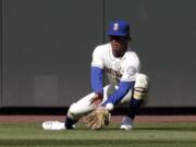 Seattle Mariners center fielder Mallex Smith misplays a fly ball from Texas Rangers’ Elvis Andrus for an error in the ninth inning of a baseball game Sunday, April 28, 2019, in Seattle.