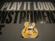 A guitar played by Chuck Berry is displayed at the entrance to the exhibit “Play It Loud: Instruments of Rock & Roll” at the Metropolitan Museum of Art in New York, Monday, April 1, 2019. The exhibit, which showcases the instruments of rock and roll legends, opens to the public on April 8 and runs until Oct. 1, 2019.