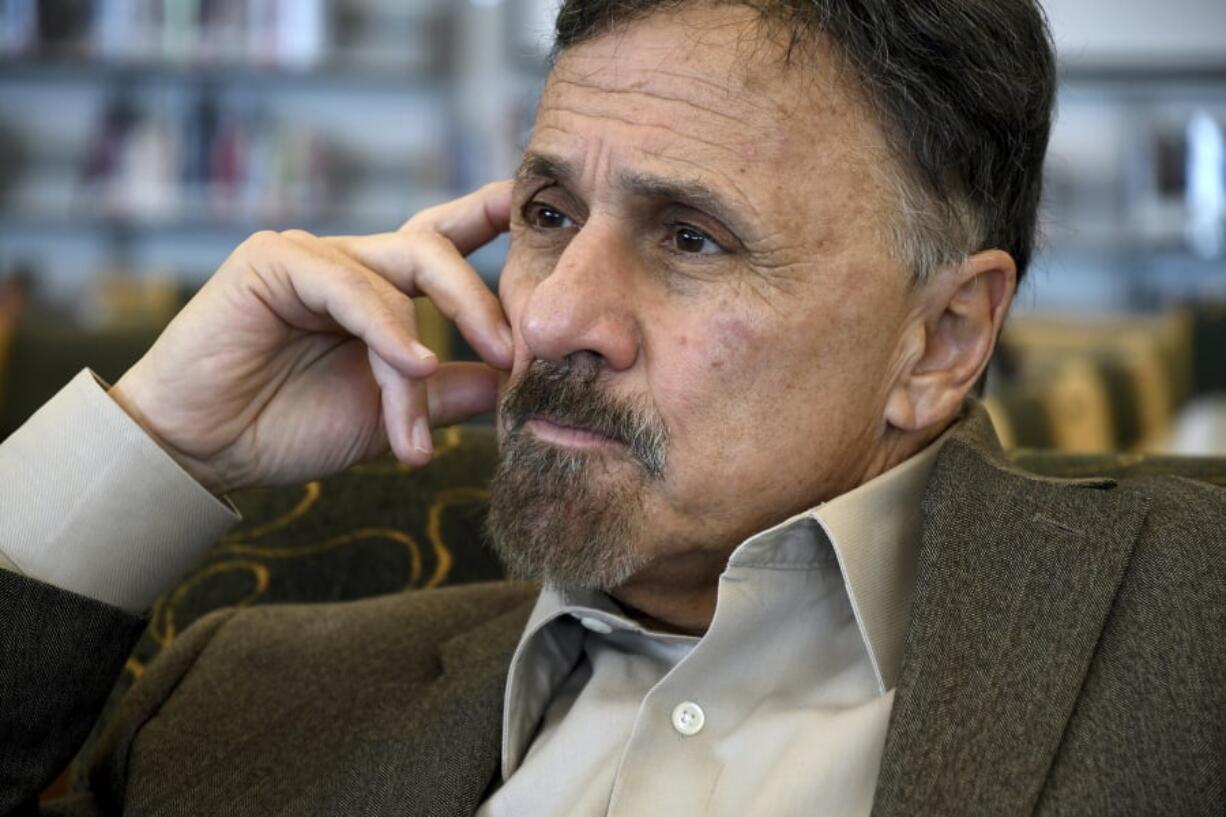 FILE - In this March 23, 2019 file photo, former Columbine principal Frank DeAngelis reflects about the upcoming 20th anniversary of the mass shooting at the suburban Denver high school. More than a dozen principals from U.S. schools impacted by shootings have formed a support network for the next colleagues who join their unenviable ranks. The Principals Recovery Network will also advocate for resources to help schools prevent violence. The initial group of 17 includes DeAngelis and a principal from Marjory Stoneman Douglas High School in Parkland, Florida. DeAngelis says it’s a network each participant wishes they’d had.