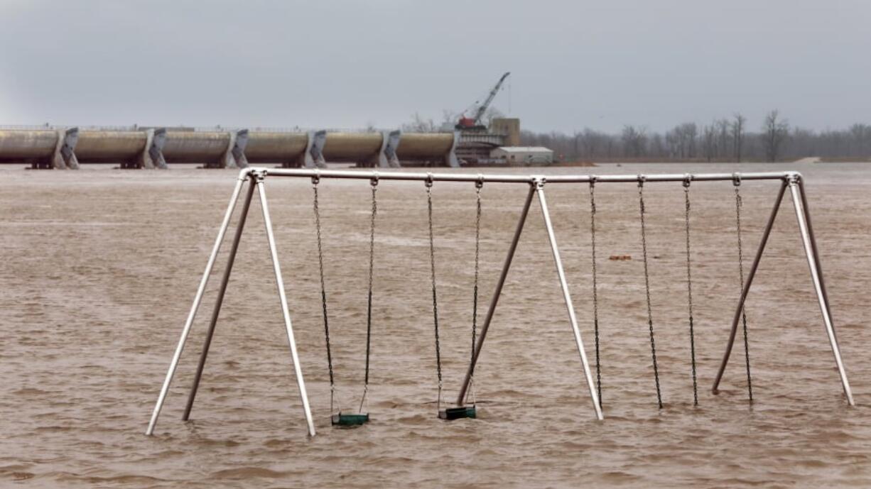 The playground in Clarksville Riverfront Park is flooded in downtown Clarksville, Mo., Saturday, March 30, 2019. The Mississippi River reached 32.8 feet Saturday afternoon, entering major flood stage for the first time this spring. It is expected to crest late Sunday at 34.2 feet, more than three feet below the 37.7 foot record of 1993. (Robert Cohen/St.