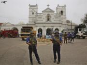 Sri Lankan Naval soldiers stand outside damaged St. Anthony’s Church, in Colombo, Saturday, April 27, 2019. Sri Lankan security forces have found 15 bodies, including six children, after militants linked to the Easter bombings set off explosives during a raid on a house in the country’s east.