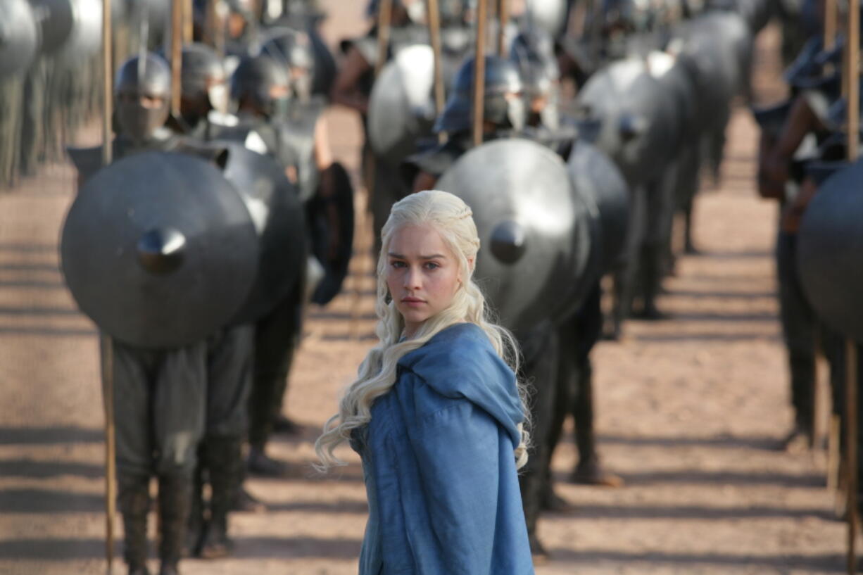 This image released by HBO shows Emilia Clarke in a scene from “Game of Thrones.” The final season premieres on Sunday.