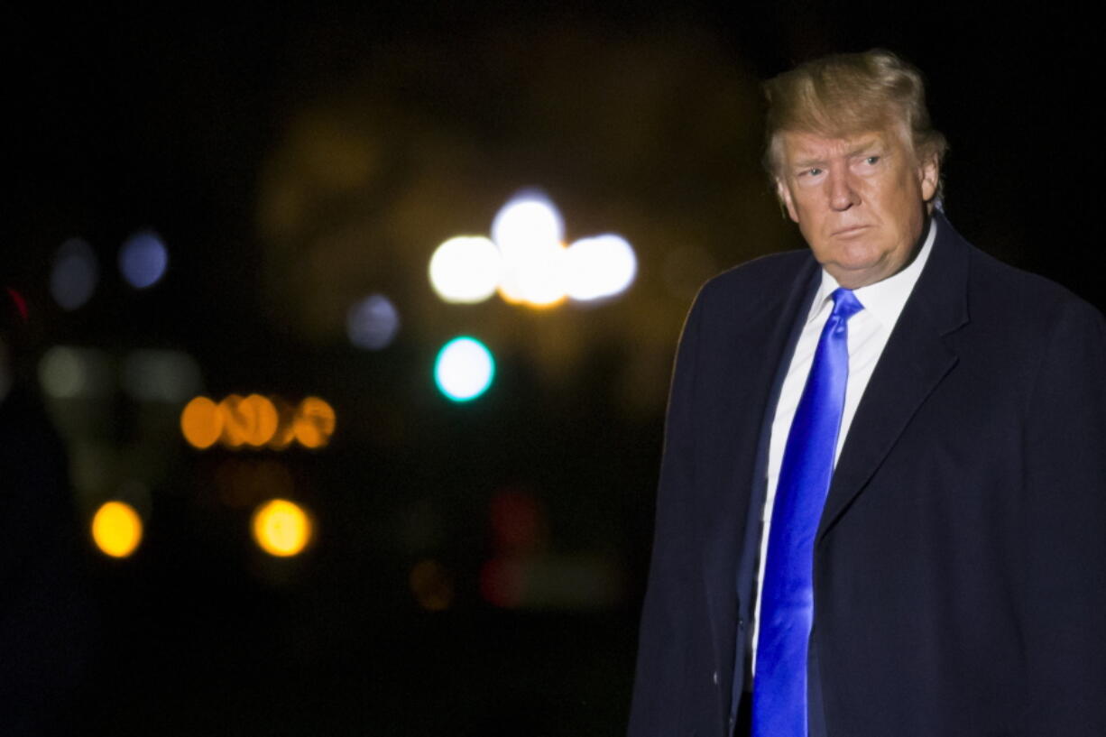 President Donald Trump walks after stepping off Marine One on the South Lawn of the White House, Saturday, April 6, 2019, in Washington. Trump is returning from a trip to California and Nevada.