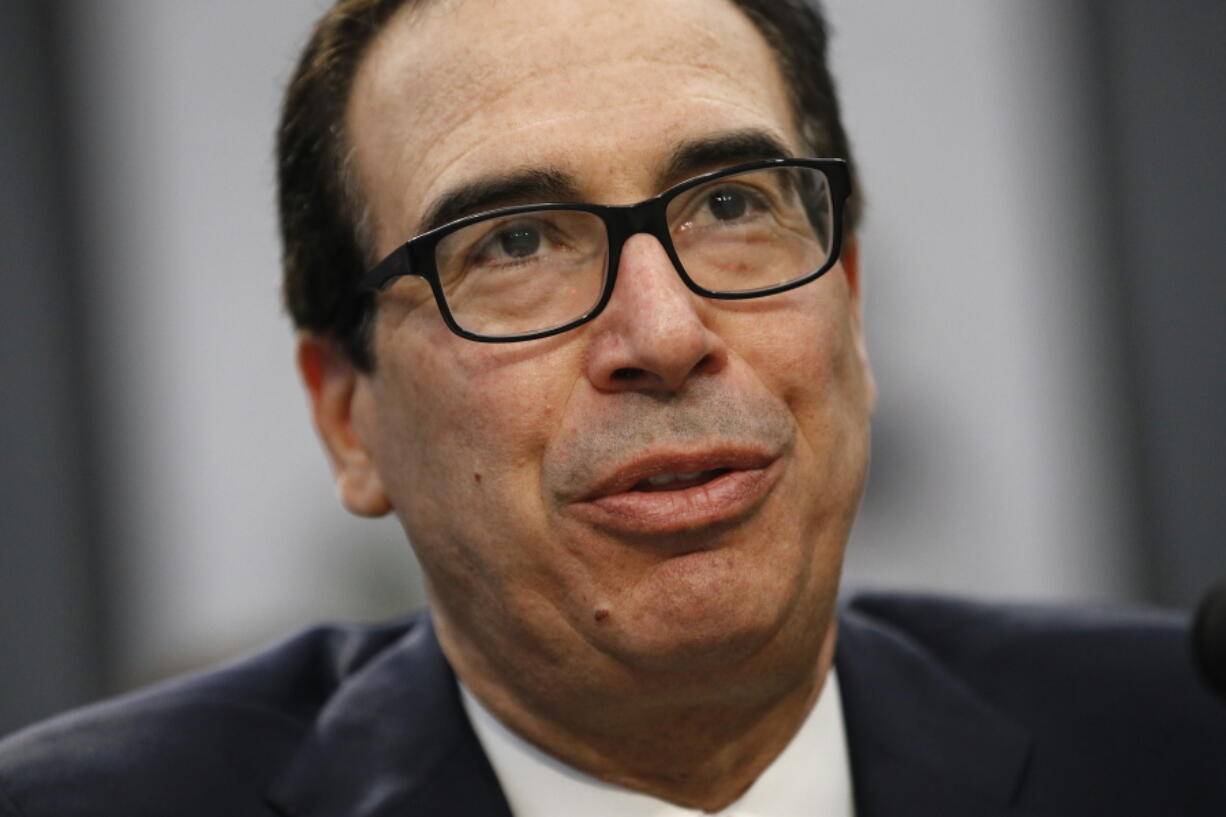 Treasury Secretary Steven Mnuchin testifies before a House Appropriations subcommittee hearing, Tuesday, April 9, 2019, on Capitol Hill in Washington. Mnuchin said Tuesday that his department intends to “follow the law” and is reviewing a request by a top House Democrat to provide Trump’s tax returns to lawmakers.