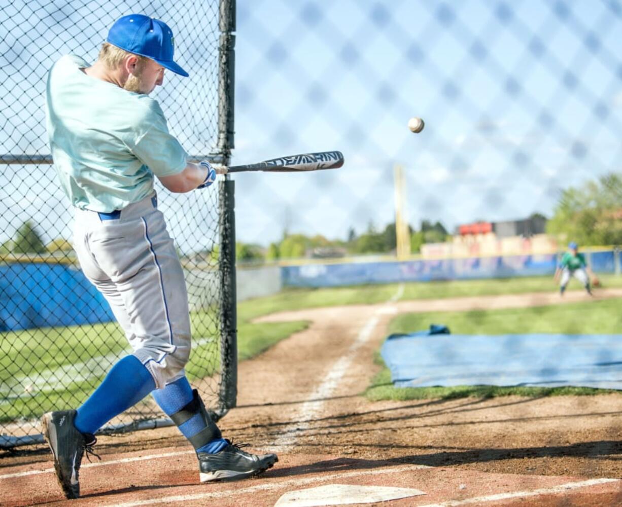 Mountain View pitcher Andrew Selden rips a line drive down the third-base line in Thursday’s bating practice. Selden is batting .389 with 15 RBI at the plate, and is 6-0 with a 0.92 ERA and 55 strikeouts in 45.2 innings on the hill.