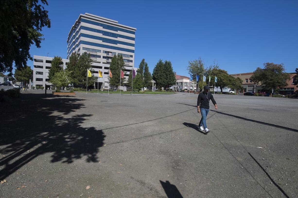 Anthony Ringering of Vancouver strolls across Block 10 in downtown Vancouver, which officials are talking about developing, Monday afternoon, Sept. 24, 2018.