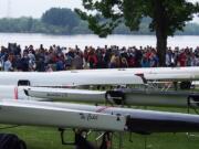 Spectators line the shore at Vancouver Lake during the 2018 USRowing Northwest Youth Championships. This year's event opens on Friday and continues through Sunday.