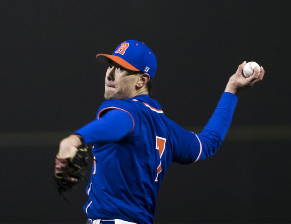 Ridgefield’s Kellen Bringhurst pitches against Kalama at the new Ridgefield Outdoor Recreation Complex Friday, March 8, 2019.