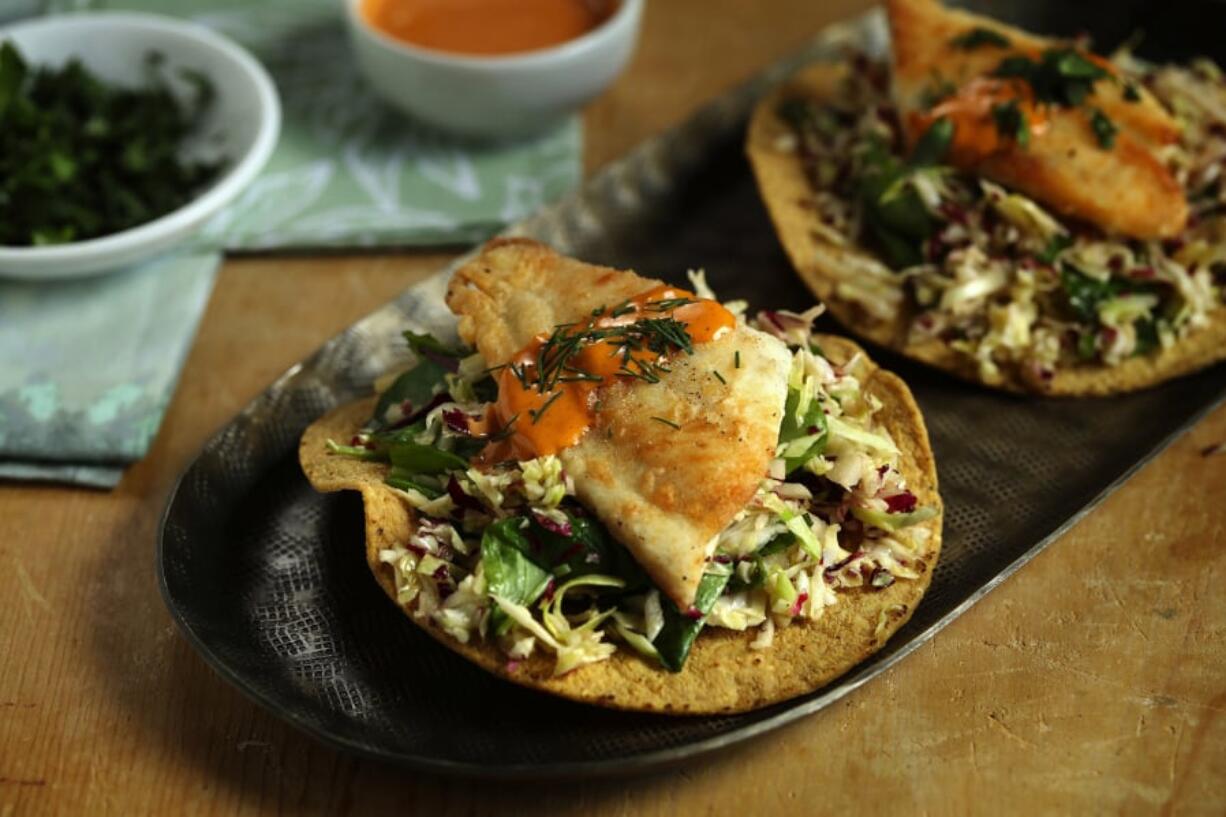 You can assemble the crispy fish and slaw tostadas at the last minute or let guests assemble their own. (E.