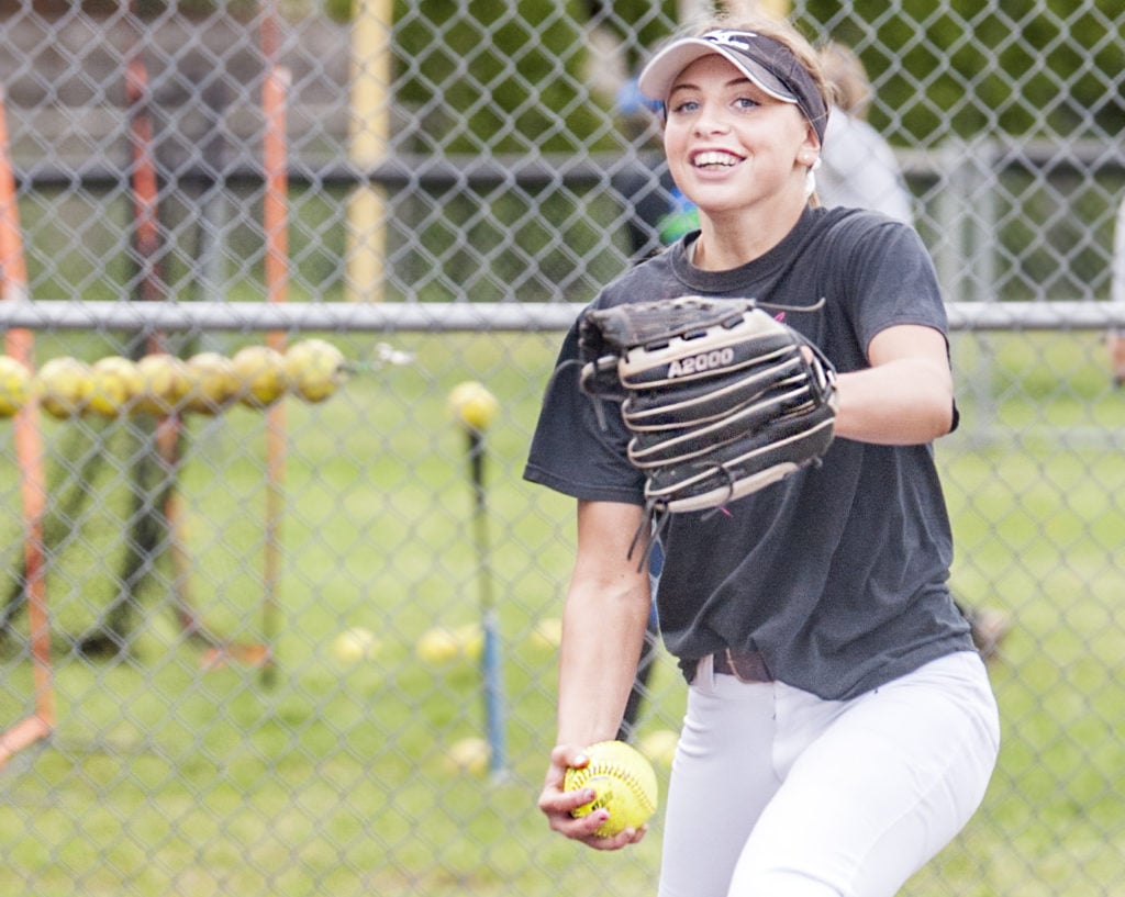 Mountain View junior pitcher Sydney Brown's smile rarely leaves her face. Her 153 strikeouts in 90 innings are intimidating, as is, her grin only throws hitters off even more, catcher Kinsey Martin says.