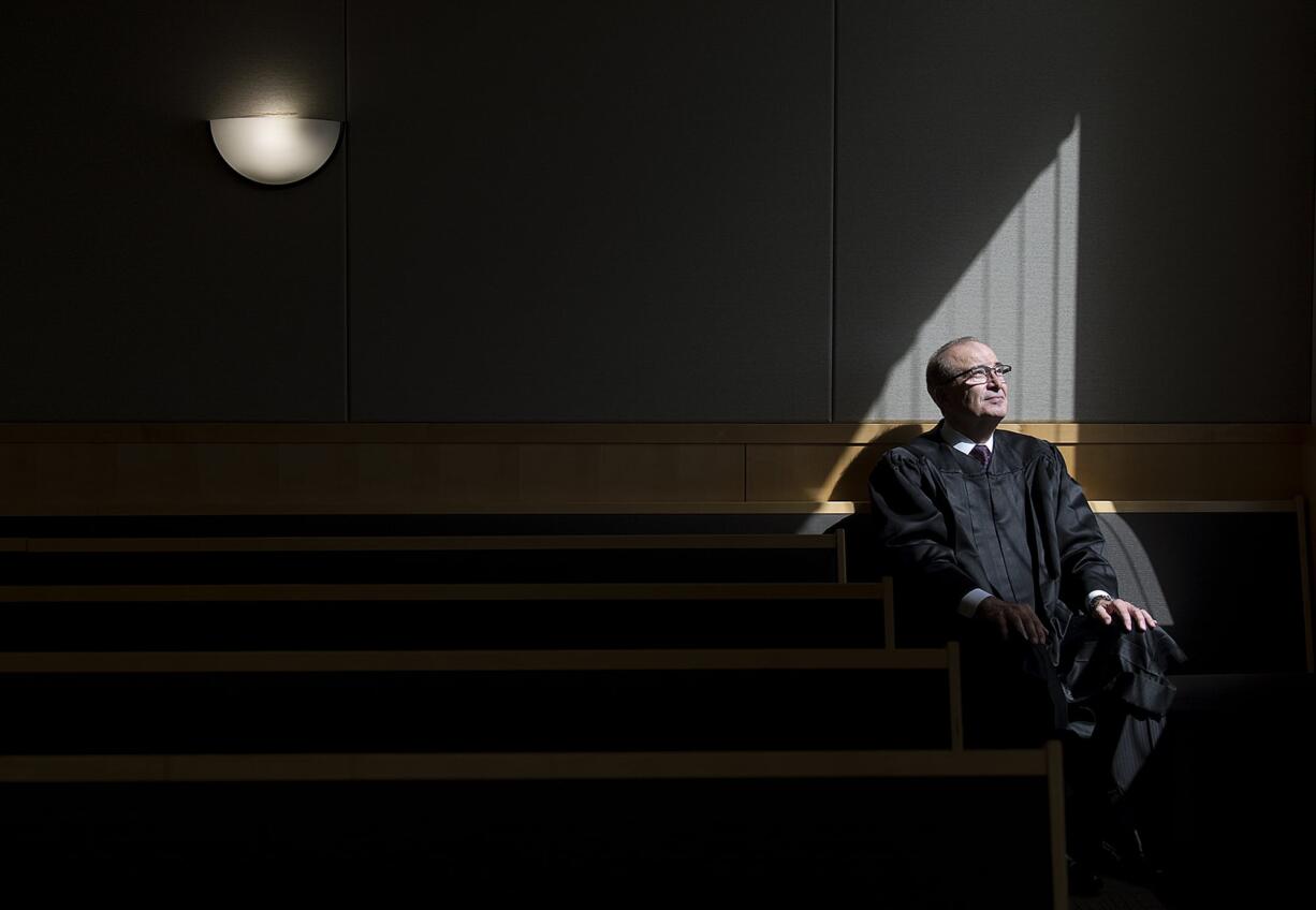 Judge James Rulli, who is retiring after decades of service, pauses for a portrait at the Clark County Courthouse. Rulli also helped create Clark County’s therapeutic drug court 20 years ago.