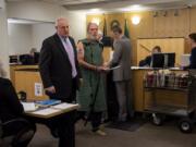 Richard Eugene Knapp, 57, center, makes a first appearance in Clark County Superior Court in connection with the 1994 rape and strangulation death of a woman in Vancouver, on May 1, 2019.