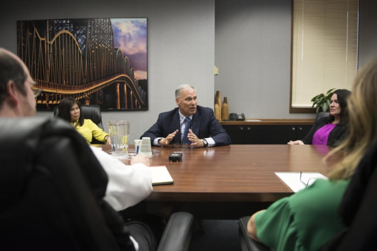 Gov. Jay Inslee speaks with The Columbian’s Editorial Board on Friday. The governor and presidential candidate touched on the state’s new biennial budget, the likelihood of a new Interstate 5 Bridge and why climate change remains the defining issue of the era.