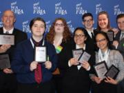 Orchards: Members of the Heritage High School Future Business Leaders of America chapter, which brought home 20 awards from the state conference in Bellevue.