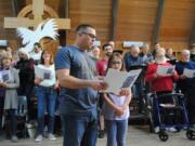 First tenors section leader Ryan Allen rehearses “A Million Dreams” with his daughter, Zoe, who turned 8 years old this week and will sing with the Vancouver Master Chorale this weekend.