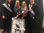 Sharyn Little, inside left, and Lauren Little, inside right, pose Saturday night after the Mr. and Ms. Hudson’s Bay mock beauty pageant and fundraiser, where their son and brother, Michael, was posthumously named Mr. Hudson’s Bay. Standing next to them are runners-up Noah Turner, left, and Trent Palen, right.