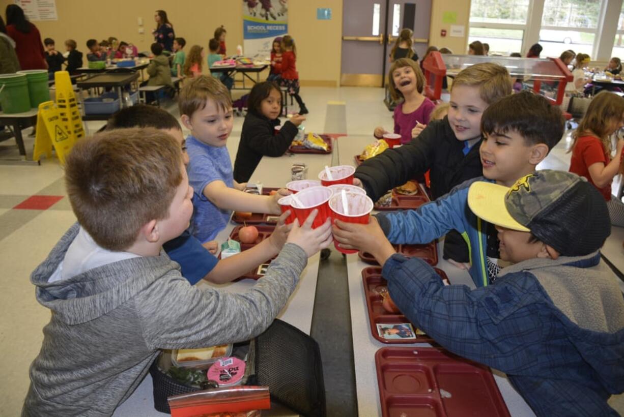 Washougal: First- and fourth-graders at Hathaway Elementary School were treated to a party after raising funds for the Leukemia and Lymphoma Society Pennies for Patients campaign. Ace King, from left, Eduardo Herrera, Connor Hamilton, Mikinlee Gerke, Ruby Burns, Ryder Noce, Ilyas Moskvin and Daniel Gambo-Rose toast with their root beer floats.